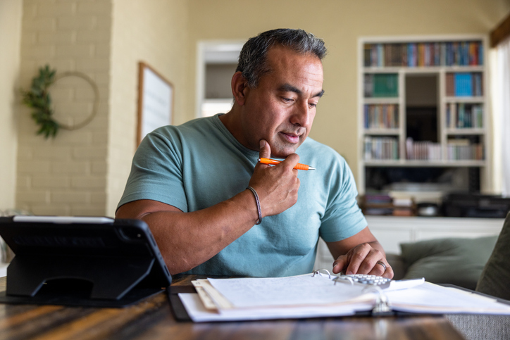 Middle-aged man working at his desk