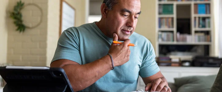 Middle-aged man working at his desk